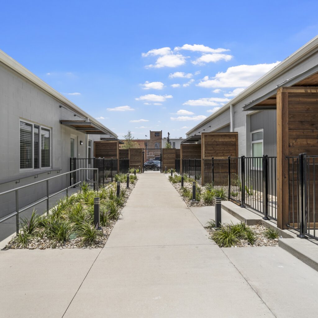 Exterior sidewalk pathway leading out of the Hawn West apartment homes.